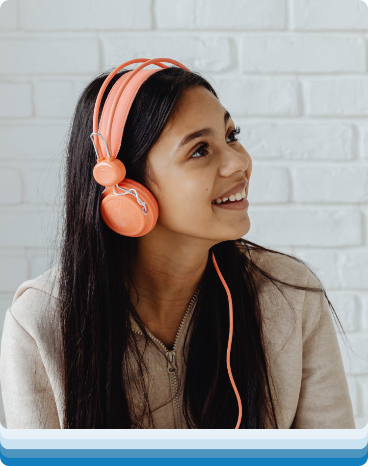 Teen listening to an activity during an autism therapy for teens session