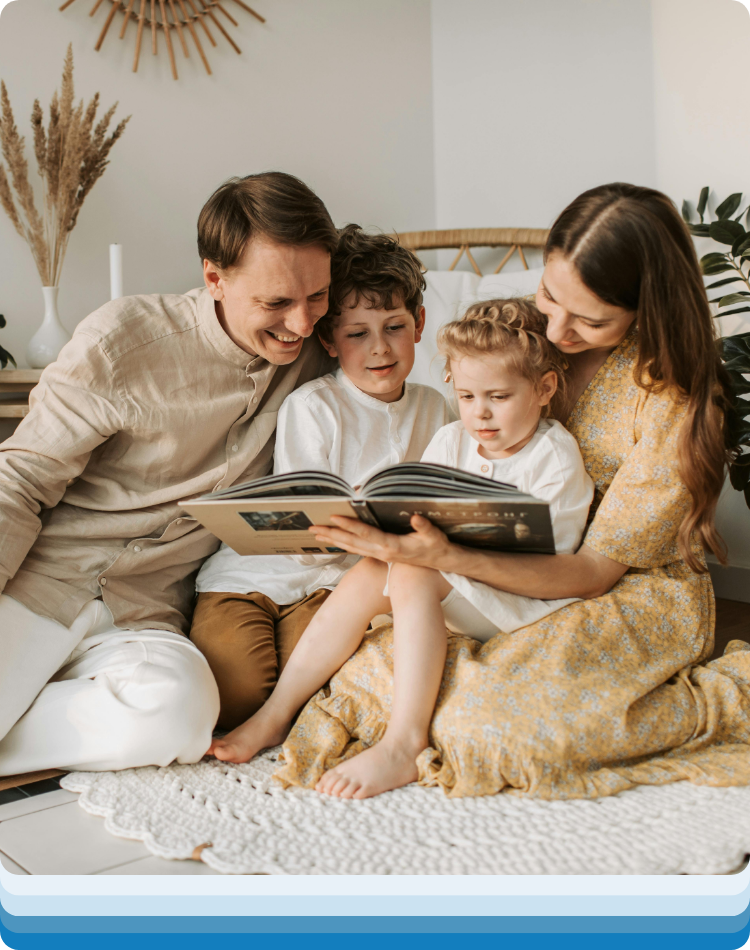 A family reading together after learning connection skills in family therapy los angeles