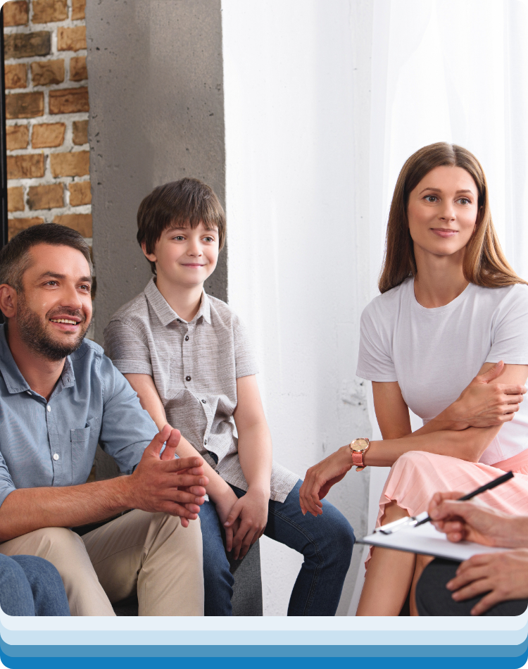 A family smiling together after learning connection skills in family therapy los angeles